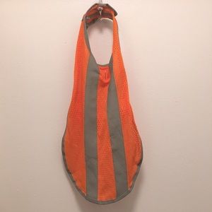 Dog size M/L reflective orange safety vest.